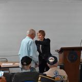 Congresswoman Lee pinning Vietnam veteran