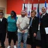 Congresswoman Lee with veteran, caseworker, and Salvation Army leaders