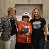 Rep. Susie Lee, Meals on Wheels recipient Mae Courson, and CCSN President and CEO Sara Ramirez