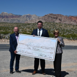 Congresswoman Lee presents check