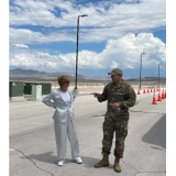 Congresswoman Susie Lee speaks with a servicemember at Creech Air Force Base