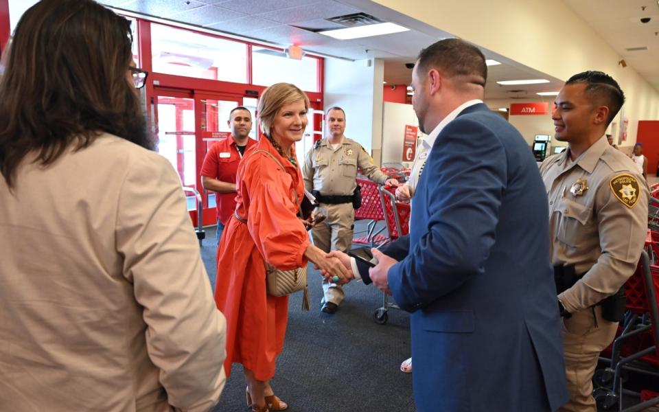 Congresswoman Lee inside Target with law enforcement officials