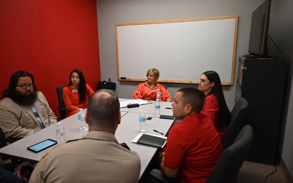 Congresswoman Lee with law enforcement and Target officials