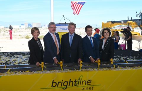 Congresswoman Lee and attendees hammer nails at groundbreaking