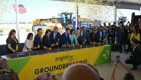 Congresswoman Lee and attendees hammer nails at groundbreaking
