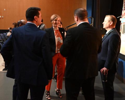 Congresswoman Lee speaking with business leaders