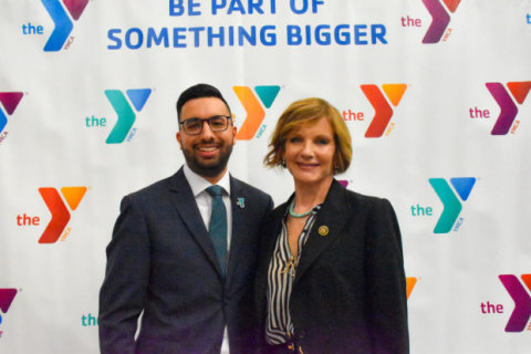 Rep. Lee and Jordan Sommaggio pose for a photo