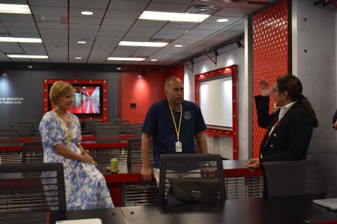Rep. Lee and Leader Jeffries listen to Natalie Stewart Mitchell 