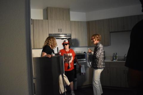 Rep. Susie Lee, Meals on Wheels recipient Mae Courson, and CCSN President and CEO Sara Ramirez