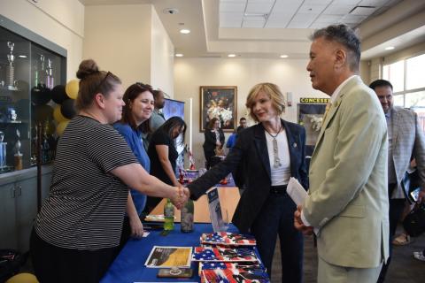 Rep. Lee, Rep. Takano, and Attendees