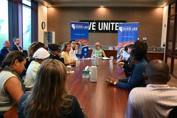 Rep. Lee and attendees speak at a roundtable