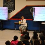 Congresswoman Lee reading to elementary school students