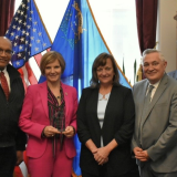 Congresswoman Lee receiving "Distinguished Community Health Center Advocate" award