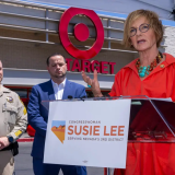 Congresswoman Lee speaking outside of Target