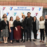 Rep. Susie Lee and YMCA staff pose for photo