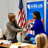 Congreswoman Lee shaking hands with SAMHSA Assistant Secretary