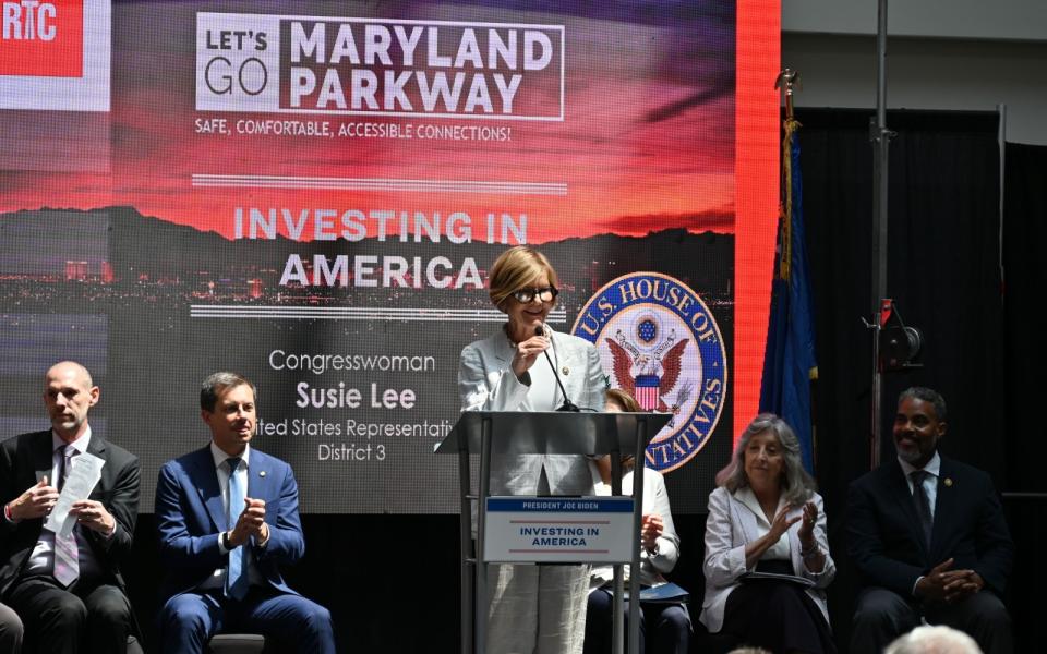 Congresswoman Lee speaking at podium